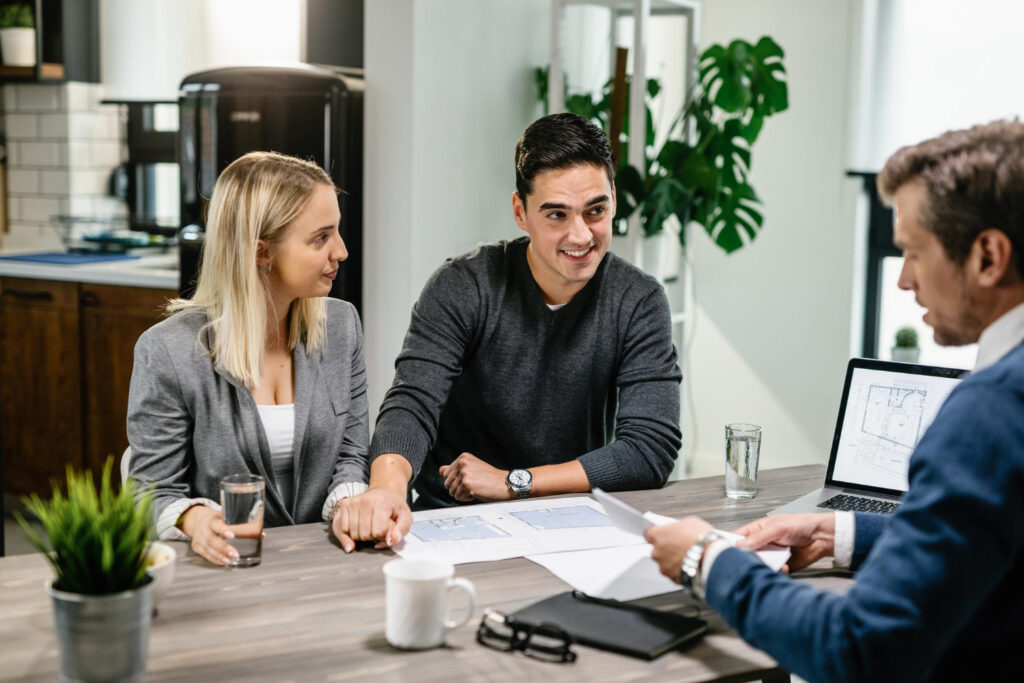 a group of people sitting at a table